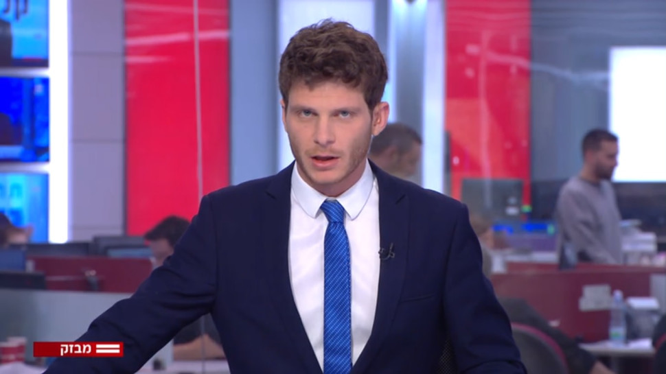 המבזקן אורי איזק (צילום: צילום מסך: קשת 12)