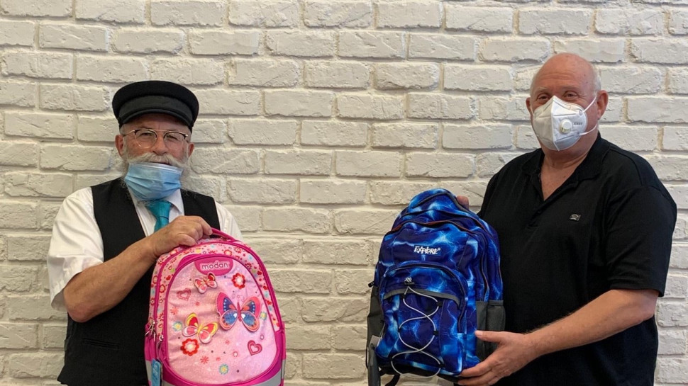 איציק אברכהן והרב יעקב גלויברמן (צילום: יהודה כהן)