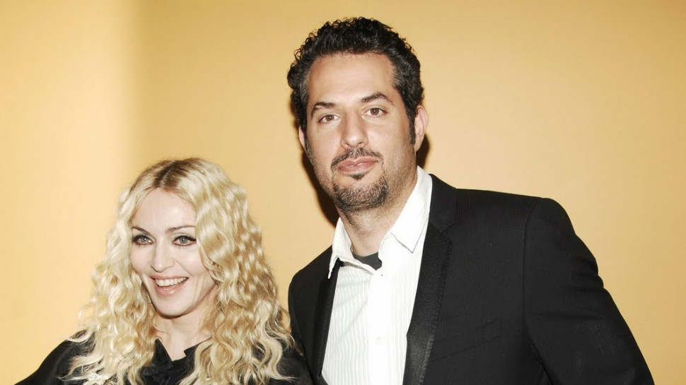 גיא עוזרי ומדונה (צילום: Getty images)