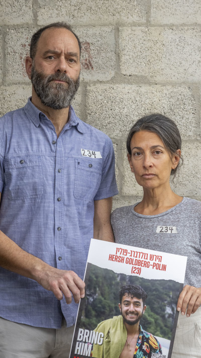 רייצ'ל וג'ון, הוריו של הירש גולדברג פולין