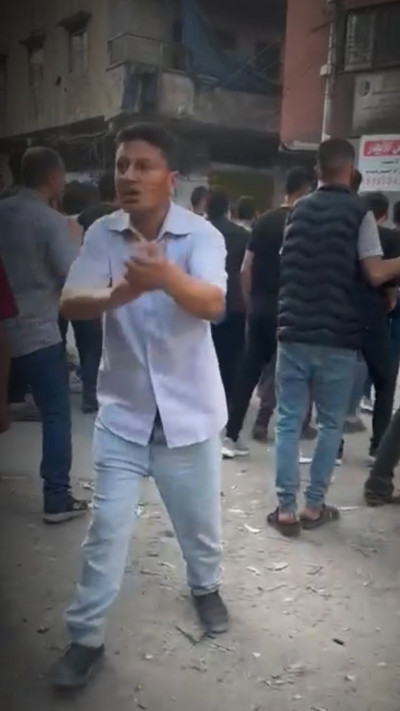 נורה למוות לעיני כל (צילום:  ''אלמונסק'' - עמוד הפייסבוק של מתפ״ש בשפה הערבית )