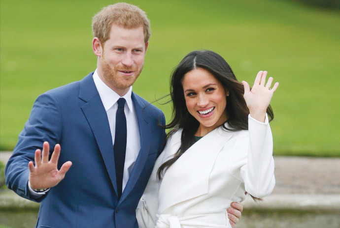 הנסיך הארי ובת זוגו מייגן מרקל (צילום: AFP)
