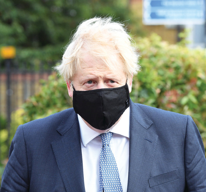 Le Premier ministre britannique Boris Johnson avec un masque 