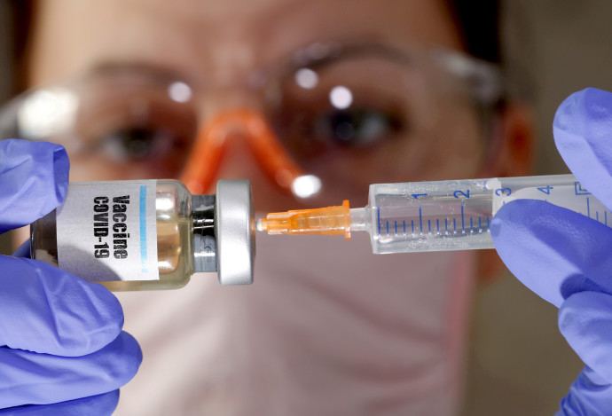 חיסון לקורונה (צילום: REUTERS/Dado Ruvic)