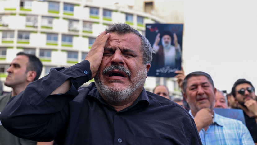 איראני בוכה (צילום:  ATTA KENARE/AFP via Getty Images)