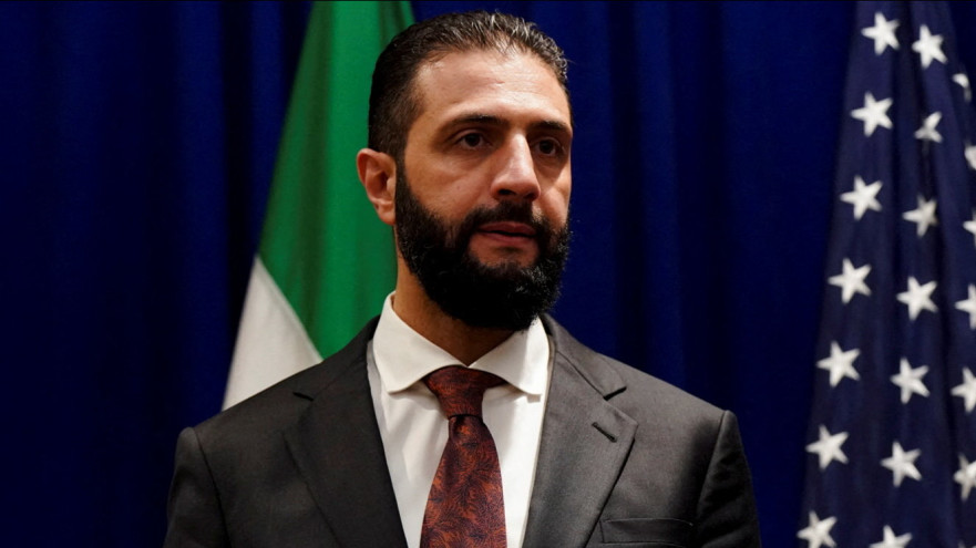 אחמד א-שרע (אל-ג'ולאני) (צילום: REUTERS/Bing Guan/Pool)