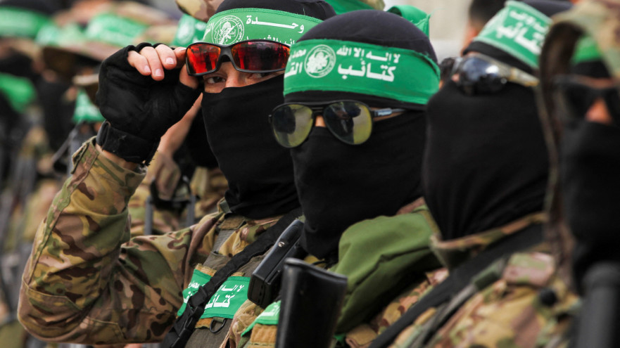 מחבלי חמאס (צילום:  REUTERS/Hatem Khaled)
