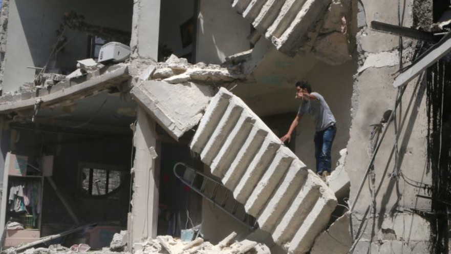 הריסות בית באזור שבשליטת המורדים בחלב