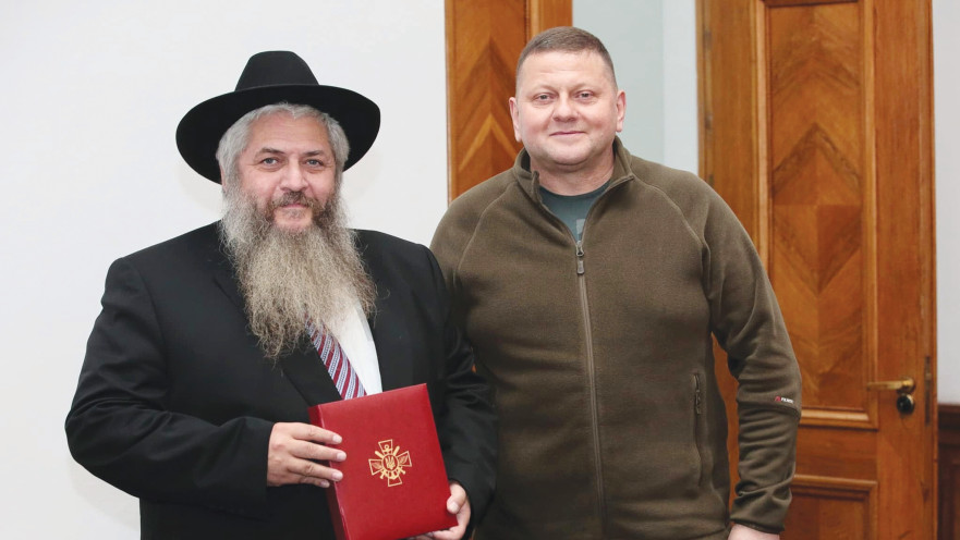 זלוז'ני בפגישתו עם הרב אסמן