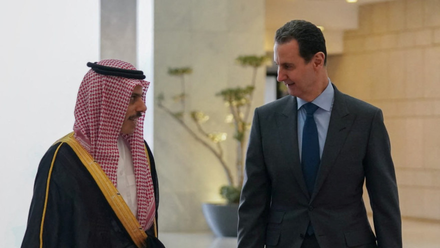 בשאר אל-אסד ושר החוץ הסעודי פייסל בן פרחאן 