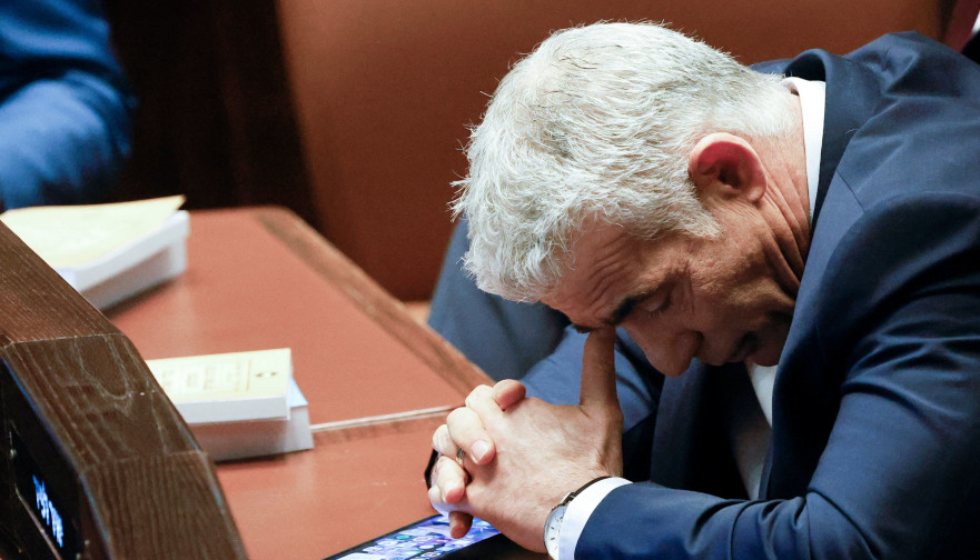 יאיר לפיד (צילום:  AMIR COHEN/POOL/AFP via Getty Images)