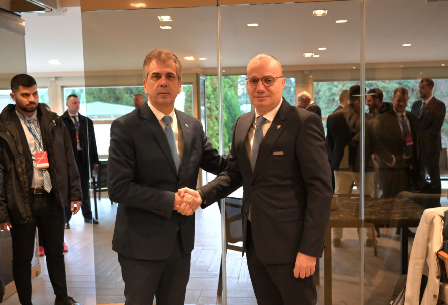 אלי כהן ומקבילו האלבני