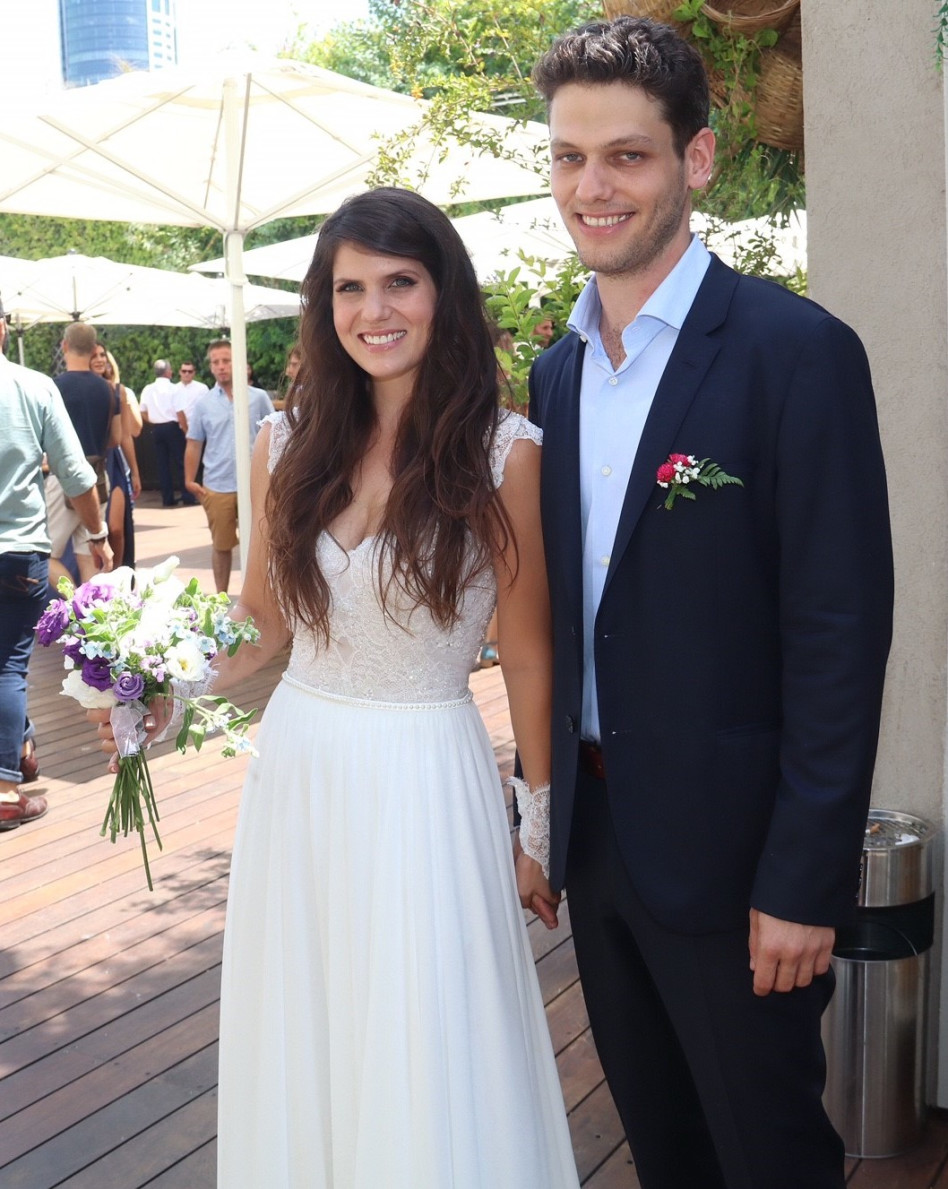 דנה וישינסקי ודניאל שוהם ביום חתונתם (צילום: אביב חופי)
