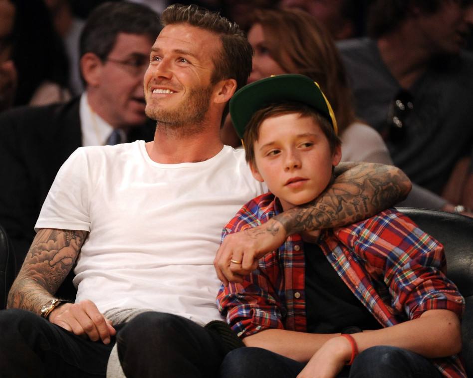 ומאוחר יותר, גם עם האב הגאה דיוויד בקהאם (צילום: גטי)