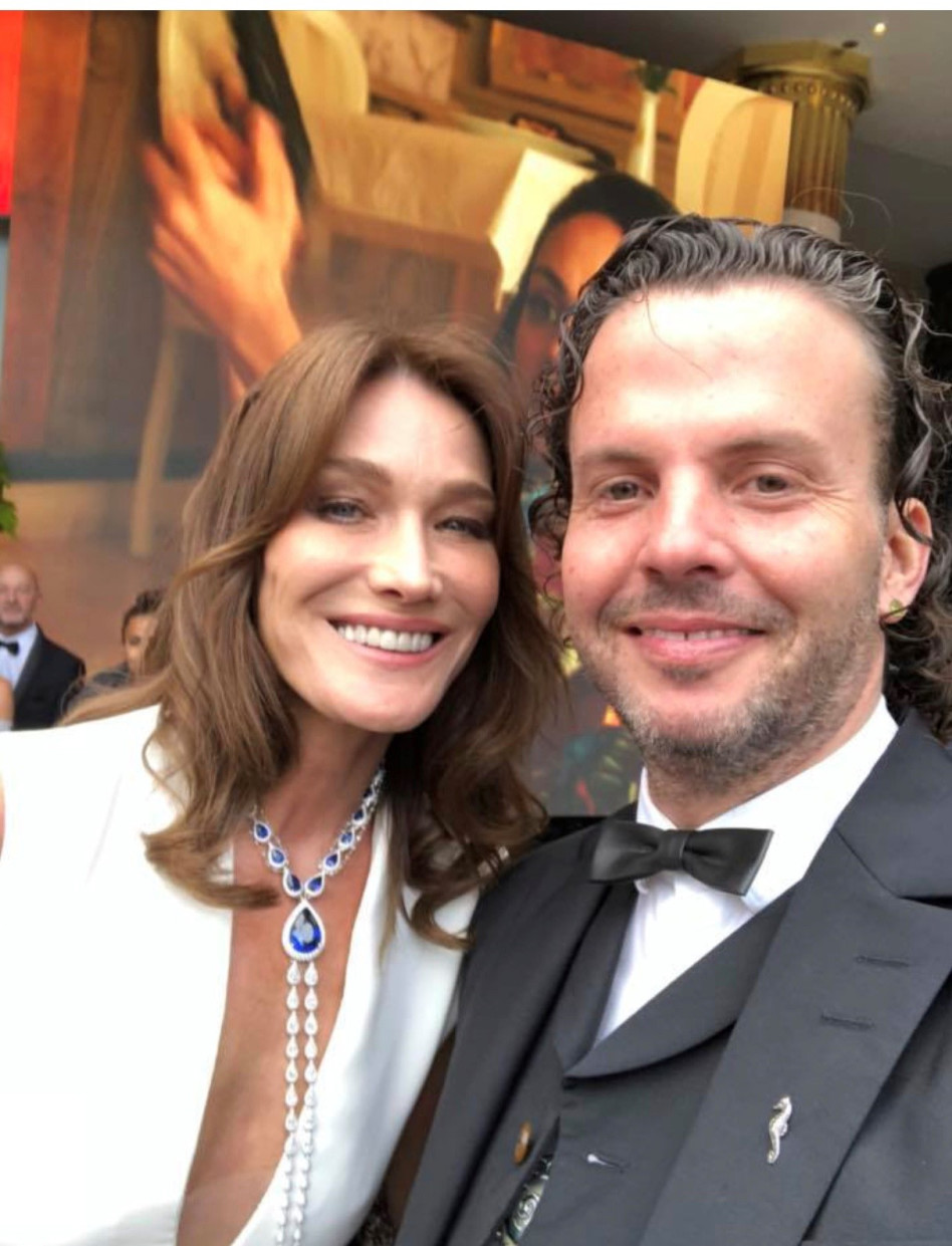 )גיל נויהאוס וקרלה ברוני (צילום מתוך פייסבוק