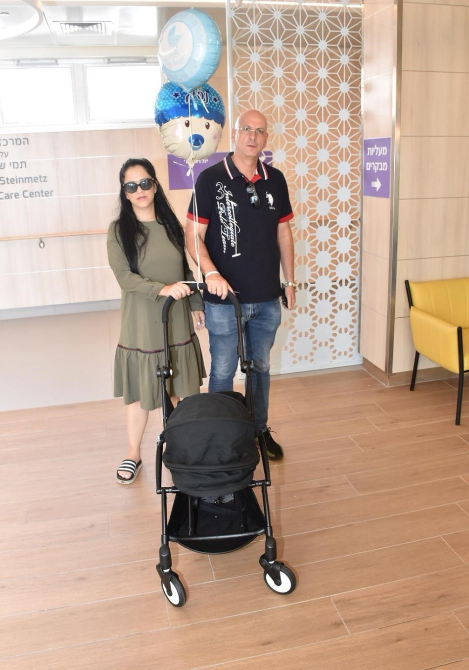 למה הפרצוף השבוז? מיקי מוכתר ובעלה אריק עורי (צילום: צ'ינו)