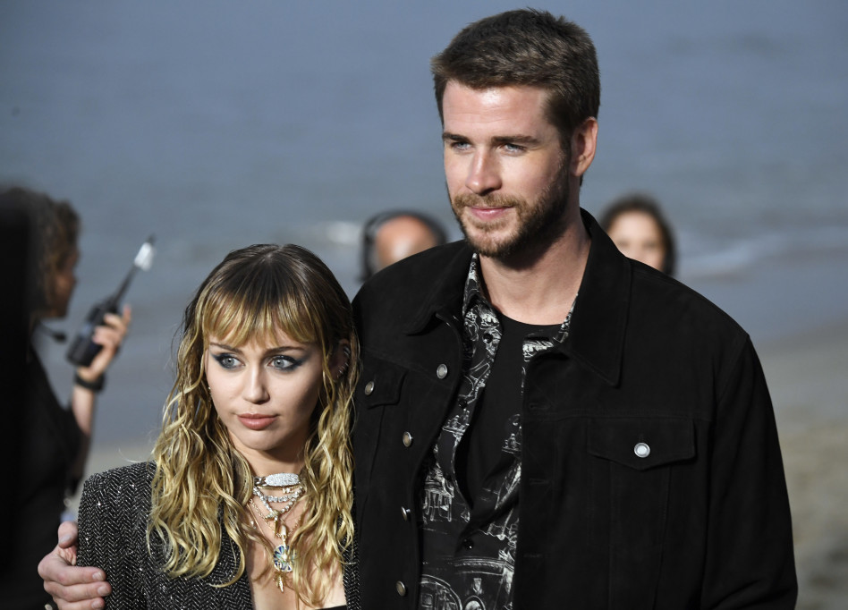 קחי את החופש שלך, חמודה. מיילי סיירוס וליאם המסוורת' (צילום: Frazer Harrison/Getty images