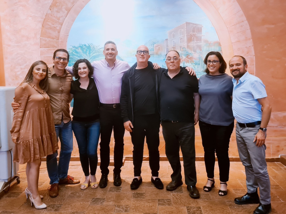 אורי כרמל, מיטל צור, אבי בניהו, אבי בלשניקוב, אריק מייקלסון, תמר גיל מנחם, ערן בוכלצב ופנינה אביטל (צילום: באדיבות מרכז לאודר לתעסוקה)