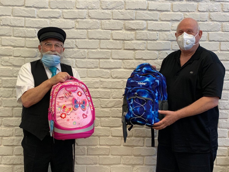 איציק אברכהן והרב יעקב גלויברמן (צילום: יהודה כהן)