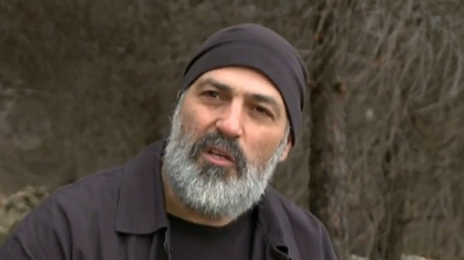 הרהורים. צבי יחזקאלי בכתבה (צילום: צילום מסך רשת 13)