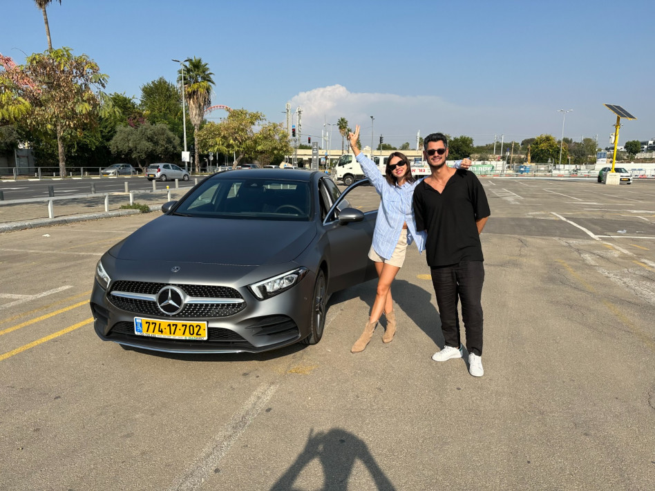 עופר חיון ורוסלנה רודינה (צילום: יח''צ גזפרו)