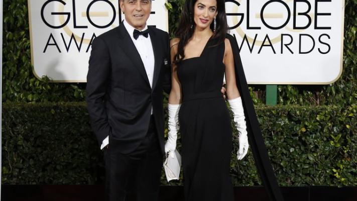 מאמי תסתירי את הילדים. ג'ורג' ואמאל קלוני (צילום: רויטרס)