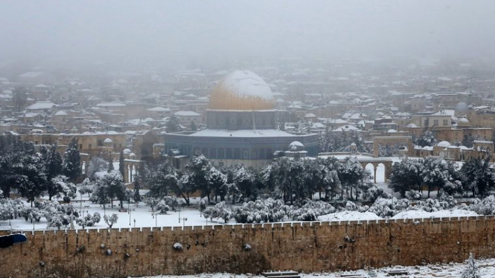 שלג בירושלים, ארכיון. עדיין לא נראה מראות כאלו, אך פתיתים עשויים לרדת. צילום: עבדאללה שנאן
