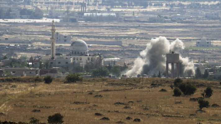 לחימה סורית סמוך לגבול הישראל ברמת הגולן. צילום: רויטרס