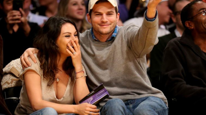 אשטון קוצ'ר ומילה קוניס (צילום: AFP)