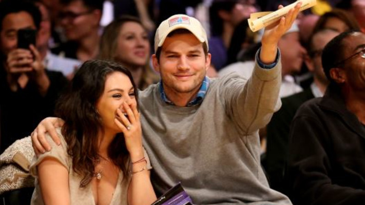 אשטון קוצ'ר ומילה קוניס (צילום: AFP)