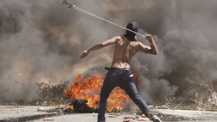 זריקת אבנים. צילום: רויטרס