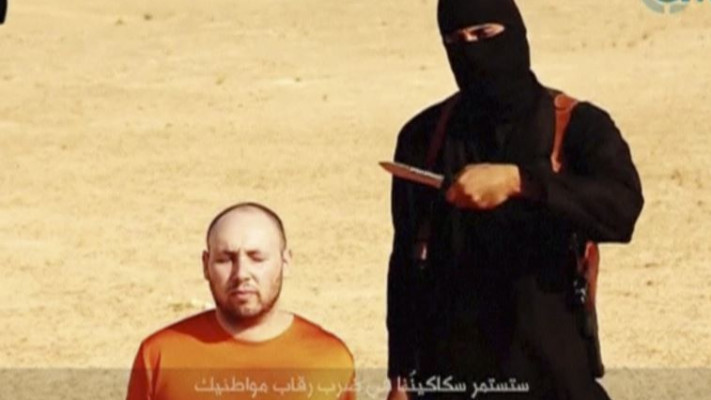 ג'ון הג'יהאדיסט עם מייק סוטולוף. צילום: רויטרס