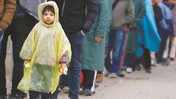 פליטים מהמזרח התיכון ביוון. צילום: רויטרס