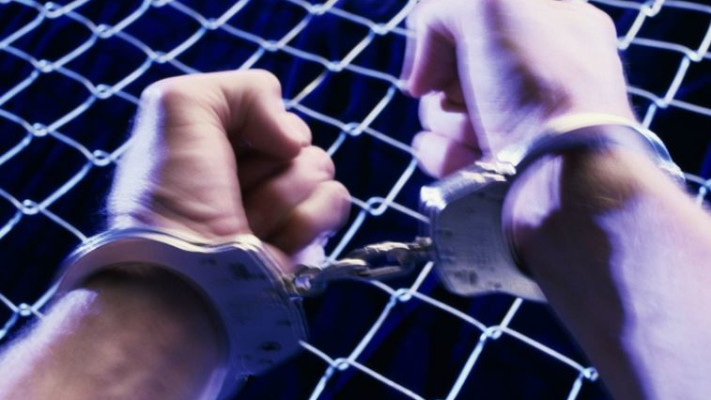 כליאה. צילום: אינג'אימג'