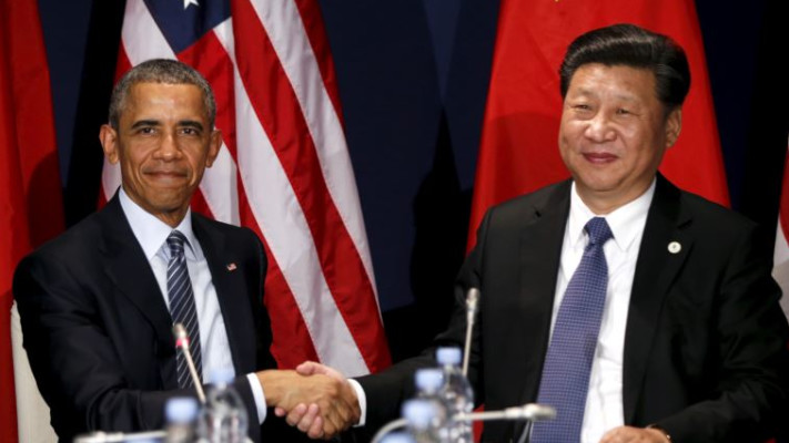 אובמה ונשיא סין בוועידת האקלים. צילום: רויטרס