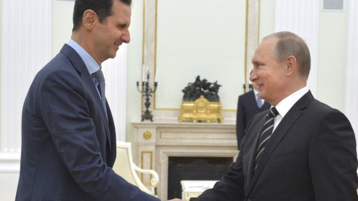 ולדימיר פורין ובשאר אל אסד. צילום:רויטרס