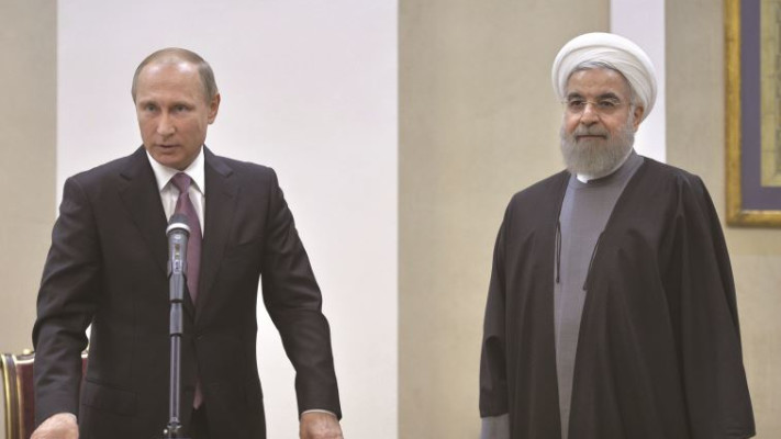 פוטין ורוחאני. צילום: רויטרס