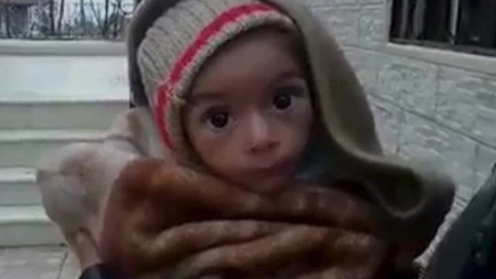 תינוק מורעב בעיר הנצורה מדאיה, צילום: רויטרס.