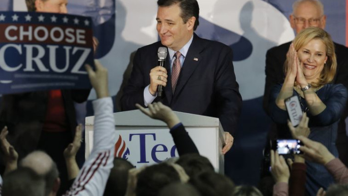 קרוז ואשתו היידי לאחר היוודע התוצאות באיווה. צילום: רויטרס