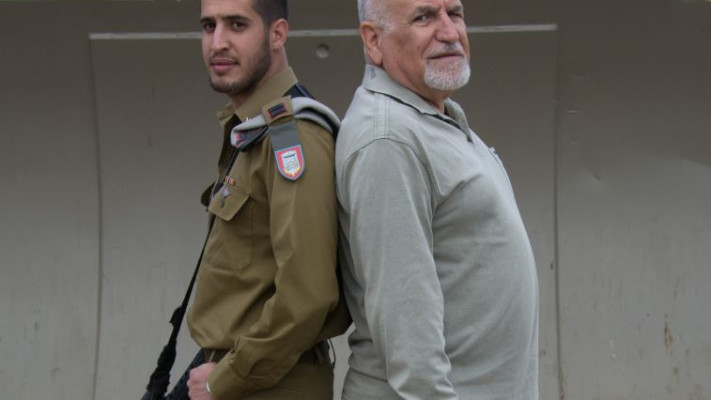 אל&quot;מ במיל' אריה שדה ובנו סגן אסף. צילום: דו&quot;צ