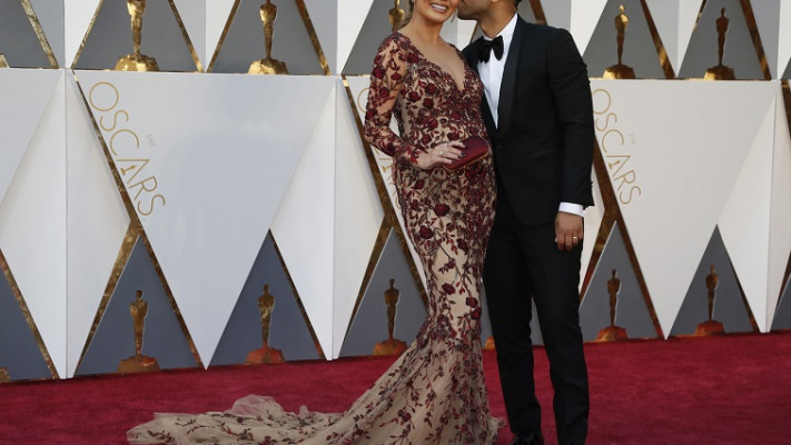 ג'ון לג'נד וכריסי טייגן (צילום: רויטרס)