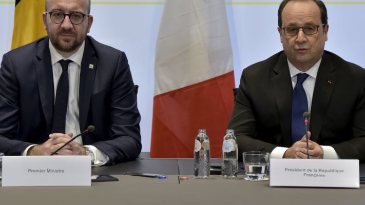 הנשיא עם הולנד עם ראש ממשלת בלגיה מישל. &quot;תוצאה חשובה של הקרב על הדמוקרטיה&quot;. צילום: רויטרס