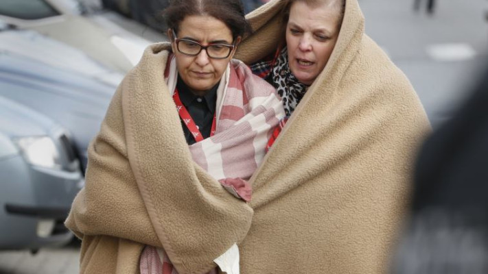 נמלטים מזירת הפיגוע בבריסל. צילום: רויטרס