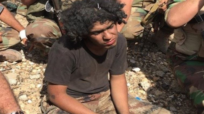 לוחם דאעש אחמד איברהים שבוי בידי הכורדים. צילום מסך