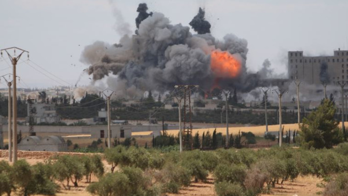 הפצצה אמריקאית על כוחות דאעש בסמוך לגבול הטורקי. צילום: רויטרס
