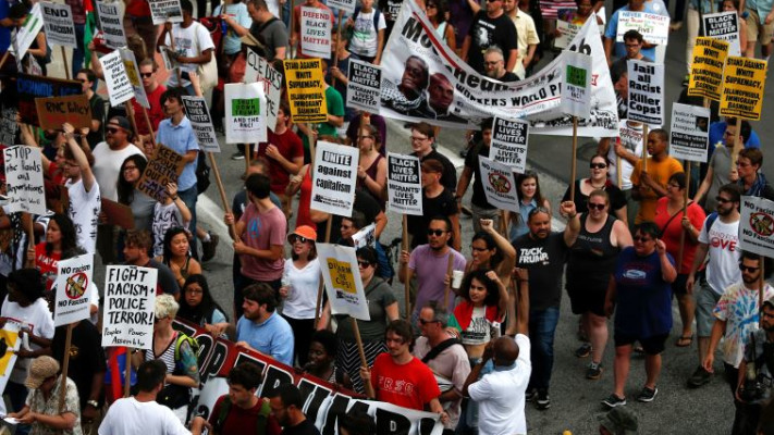 מפגינים נגד דונלד טראמפ בפתח הוועידה הרפובליקנית. צילום: רויטרס