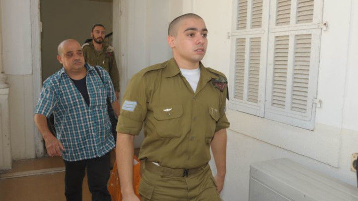 אזריה ואביו. צילום: אבשלום ששוני