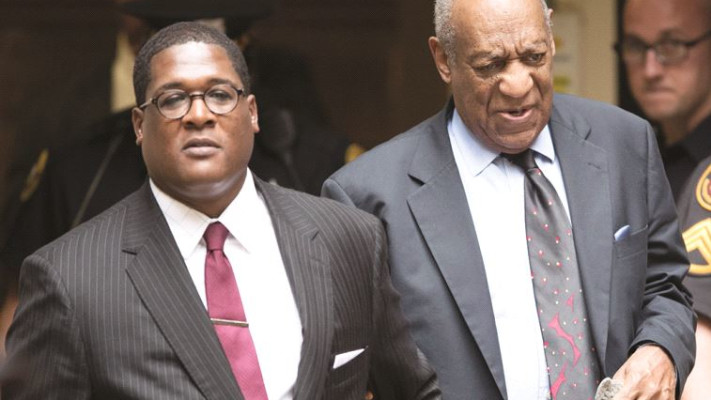 ביל קוסבי ופרקליטו. צילום: AFP