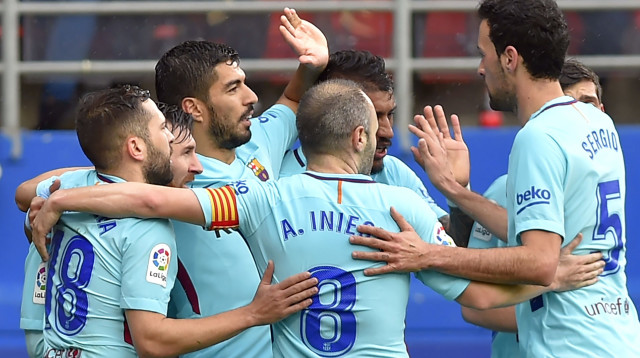 בוסקטס, אינייסטה (צילום: AFP)