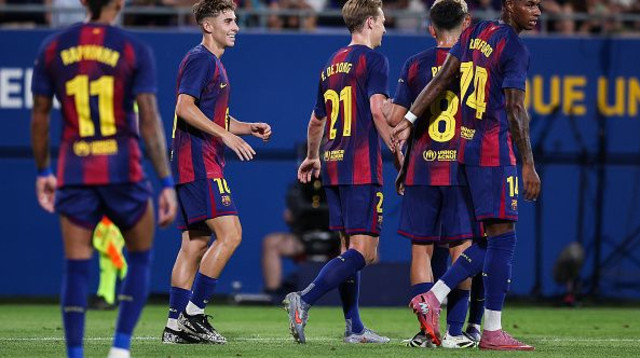 שחקני ברצלונה חוגגים (צילום: Eric Alonso)